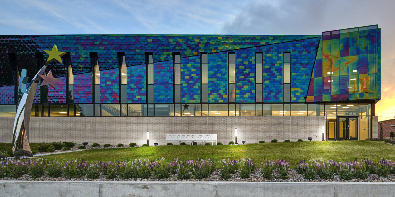 UnityPoint Health Des Moines Blank Children’s STAR & Developmental Center, featuring a colorful interference stainless steel facade, by INVISION Architecture.